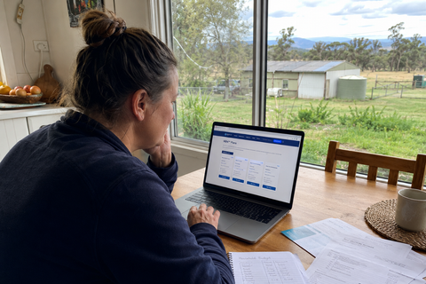 Regional homeowner researching Amazon Leo plans and pricing in Australia before ordering satellite internet